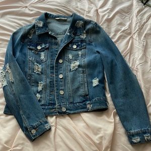Distressed denim jacket